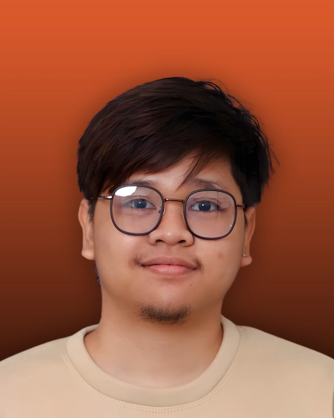 Kenneth Yandan, GoHighLevel automation specialist, smiling in a beige sweater
